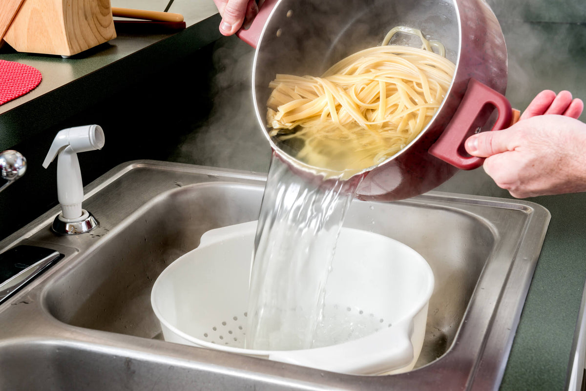 straining pasta